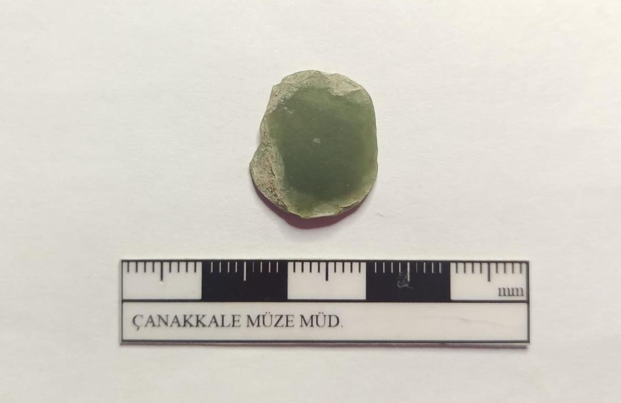 A rare jade stone uncovered in the Troy II settlement layers, Sept. 27, 2025. (Photo via Ministry of Culture and Tourism)