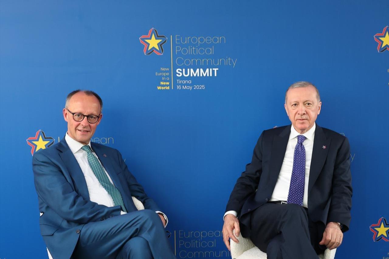 German Chancellor Friedrich Merz and Recep Tayyip Erdogan, President of Türkiye, sit together on the sidelines of the European Political Community summit., May 16, 2025, Tirana, Albania. (AA Photo)
