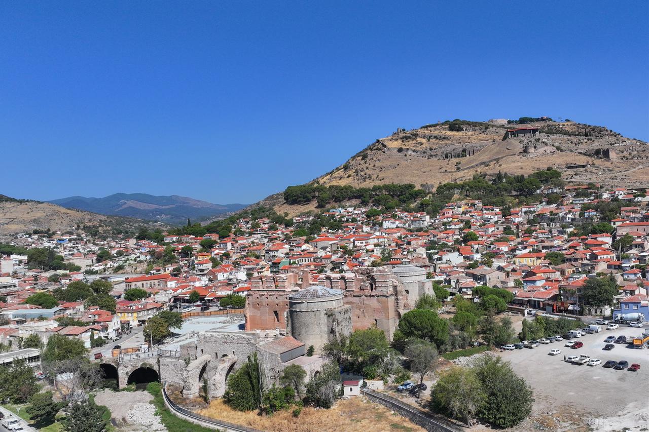 An aerial view shows restoration, conservation, and landscaping works continue at the Red Basilica, a temple named after its distinctive red bricks, located in the ancient city of Pergamon in Izmir’s Bergama district, Türkiye, Sept. 26, 2025. (AA Photo)
