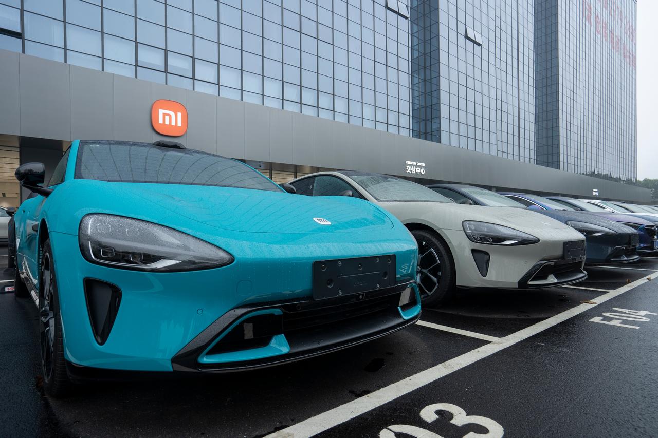 Photo shows rows of Xiaomis new Su7 electric carsat its delivery and service center in Shenzhen, Guangdong Province, China, accessed on Sept. 27, 2025. (Adobe Stock Photo)