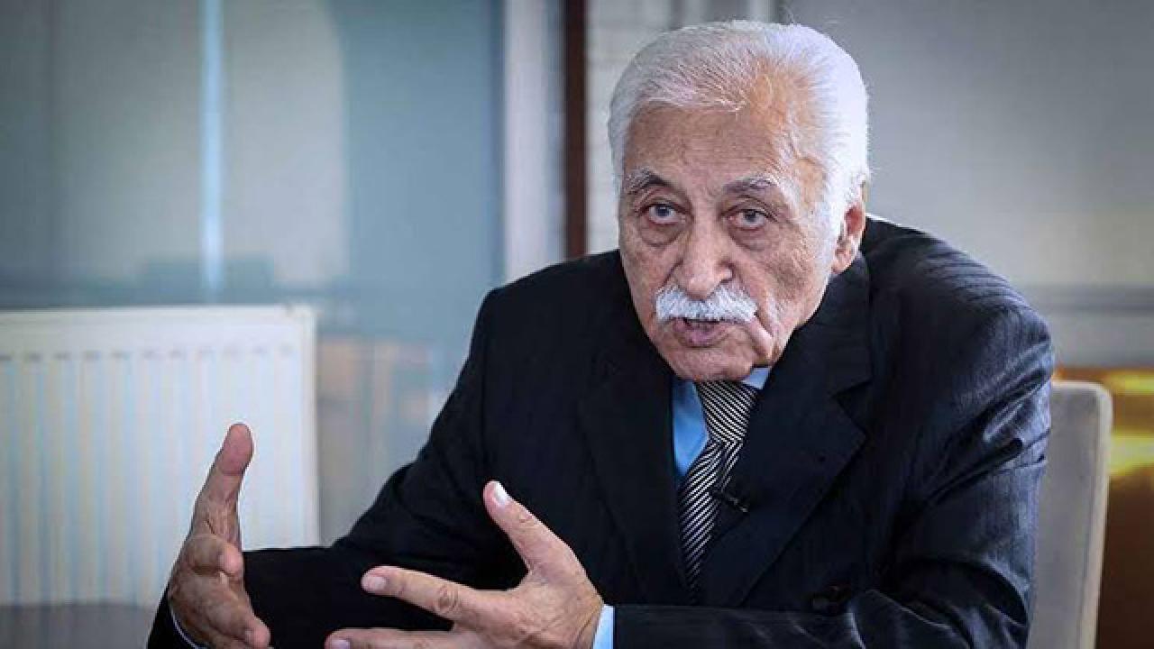 Turkish poet and writer Yavuz Bulent Bakiler gestures while speaking during an interview. (AA Photo)