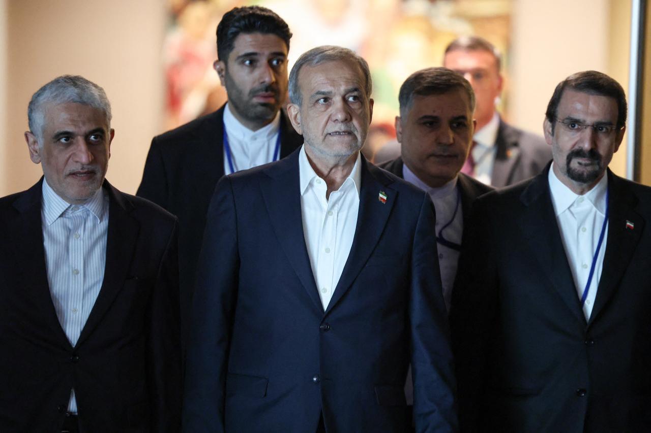 Iran's President Masoud Pezeshkian (C) walks on his way to a bilateral meeting with France's President Emmanuel Macron on the sidelines of the United Nations General Assembly at UN headquarters in New York City, September 24, 2025. (AFP Photo)