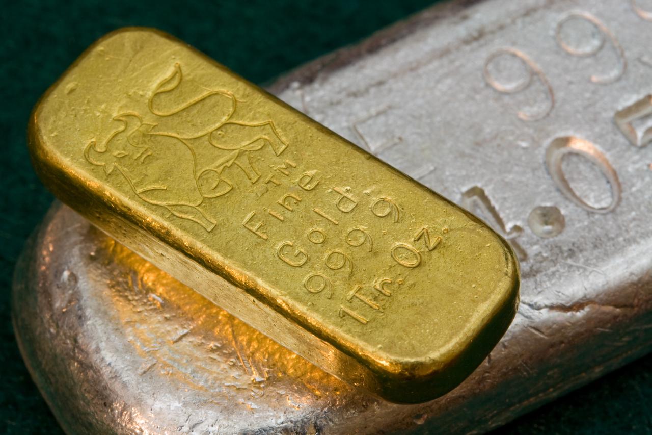 File photo shows gold and silver bars. (Adobe Stock Photo)