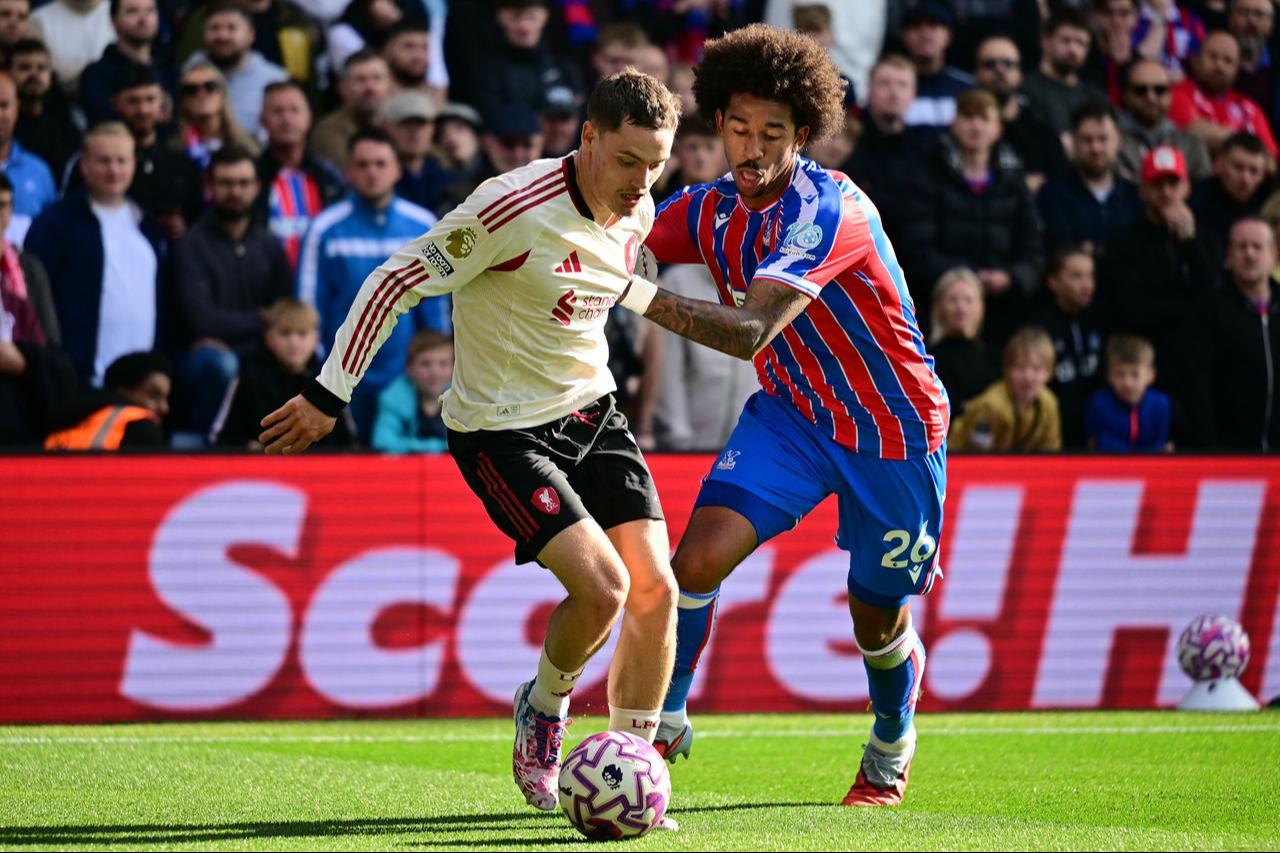 Liverpool's German midfielder #07 Florian Wirtz (L) vies with Crystal Palace's US defender #26 Chris Richards (R) during the Premier League match at Selhurst Park in London, England, September 27, 2025. (AFP Photo)