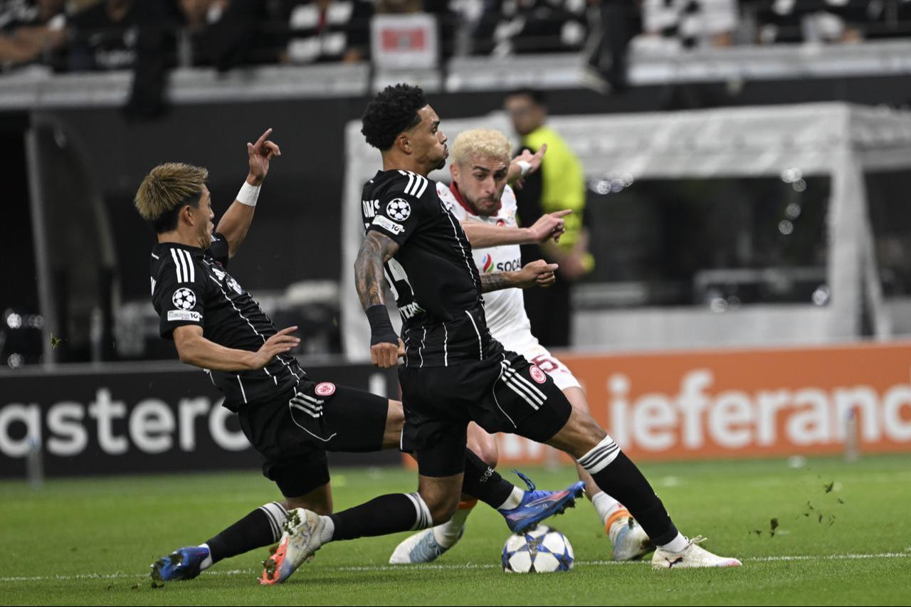 Baris Alper Yilmaz (R) of Galatasaray in action against Ritsu Doan (L) of Eintracht Frankfurt during the UEFA Champions League match between Eintracht Frankfurt and Galatasaray at Deutsche Bank Park in Frankfurt, Germany, Sep. 18, 2025. (AA Photo)