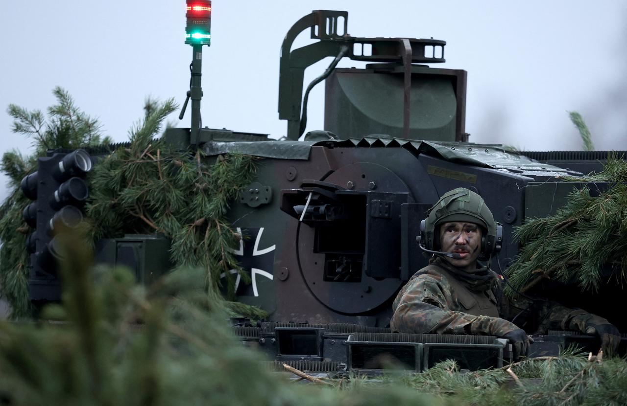 A German soldier is seen on a Puma infantry fighting vehicle of the German armed forces Bundeswehr during an exercise in Moeckern, eastern Germany, January 26, 2023. (AFP Photo)