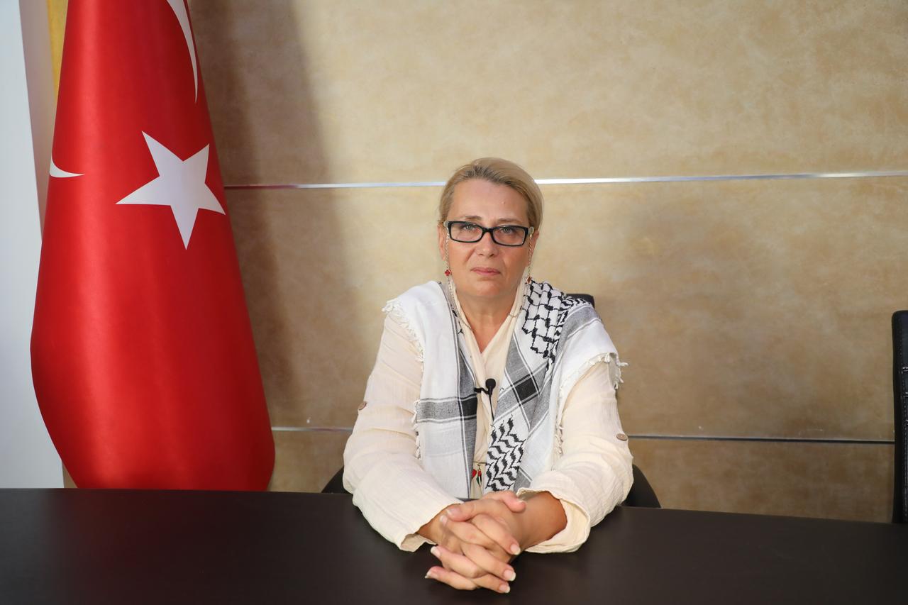 Aycin Kantoglu, a translator from the Türkiye Delegation of the Global Sumud Flotilla, speaks to a reporter in Tunis, Tunisia, Sep. 2, 2025. (AA Photo)