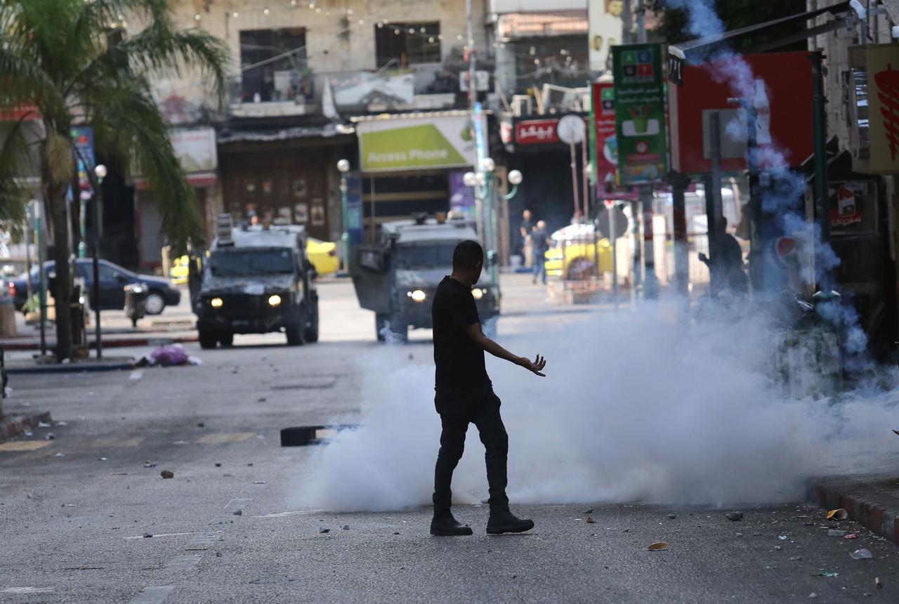 A view of the clashes that broke out Israeli soldiers and Palestinian youths protesting the raid of Israeli forces after Israeli army carried out a raid in Nablus, West Bank on August 27, 2025. (AA Photo)