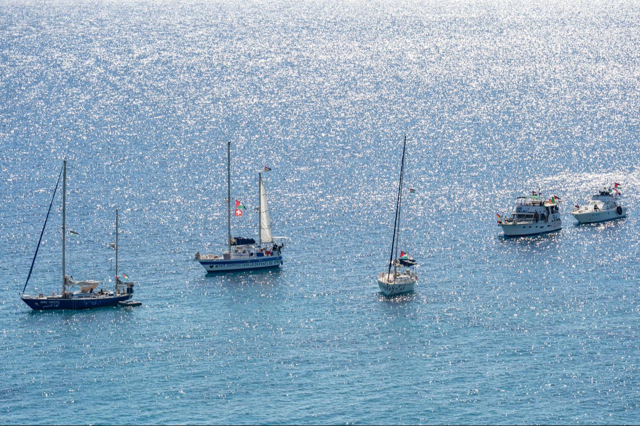 A group of ships of the Global Sumud Flotilla to Gaza are shown moored at the small island of Koufonisi, south of the island of Crete on September 26, 2025. (AFP Photo)