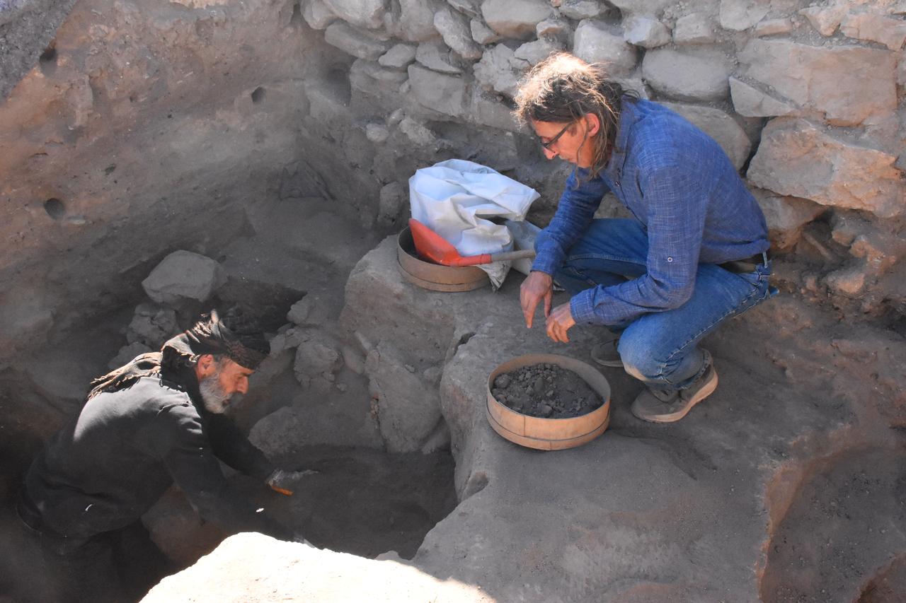 Archaeologists work inside excavation trenches at Uc Hoyuk in Afyonkarahisar, Türkiye, Sept. 29, 2025. (AA Photo)
