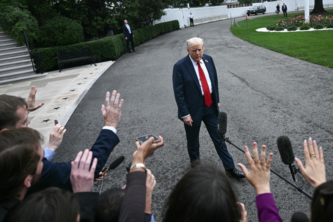 US President Donald Trump speaks to the press before boarding Marine One as he departs from the South Lawn of the White House in Washington, DC, Sept. 30, 2025. (AFP Photo)