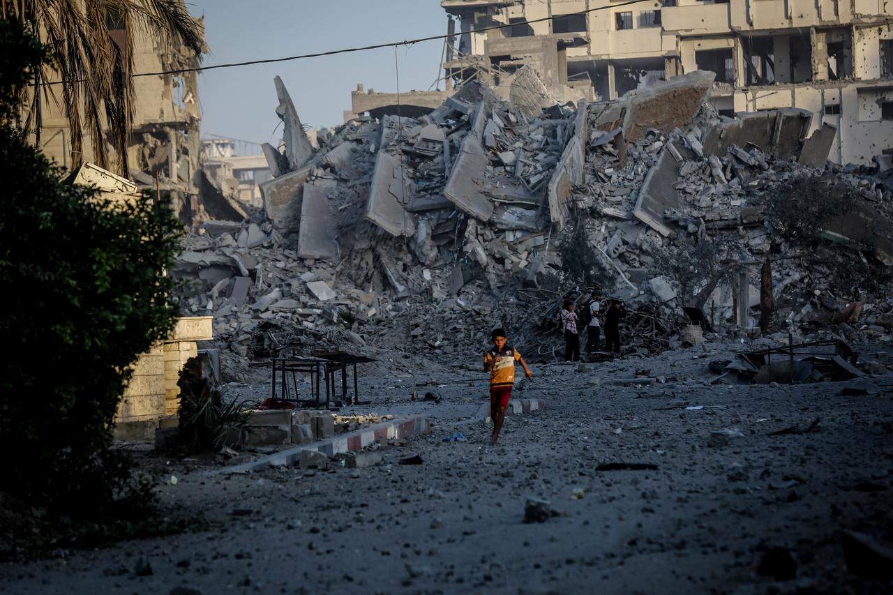 Smoke rises after Israeli airstrikes hit a multi-story building named Mekke in the Southern Rimal neighborhood in Gaza City, Gaza, on September 28, 2025. (AA Photo)