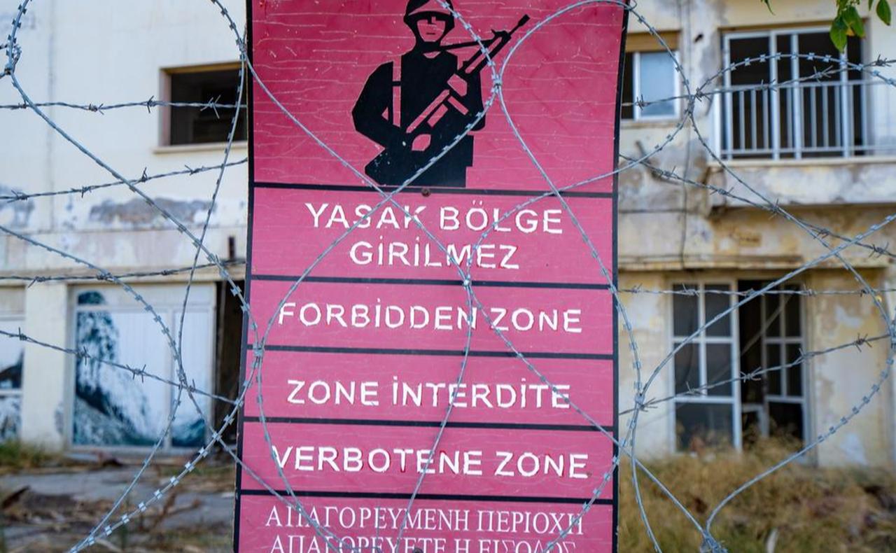 Military forbidden zone no entry sign in the ghost town Kapali Maras district in Gazimagusa, Turkish Republic of Northern Cyprus on November 8 2023. (Adobe Stock Photo)