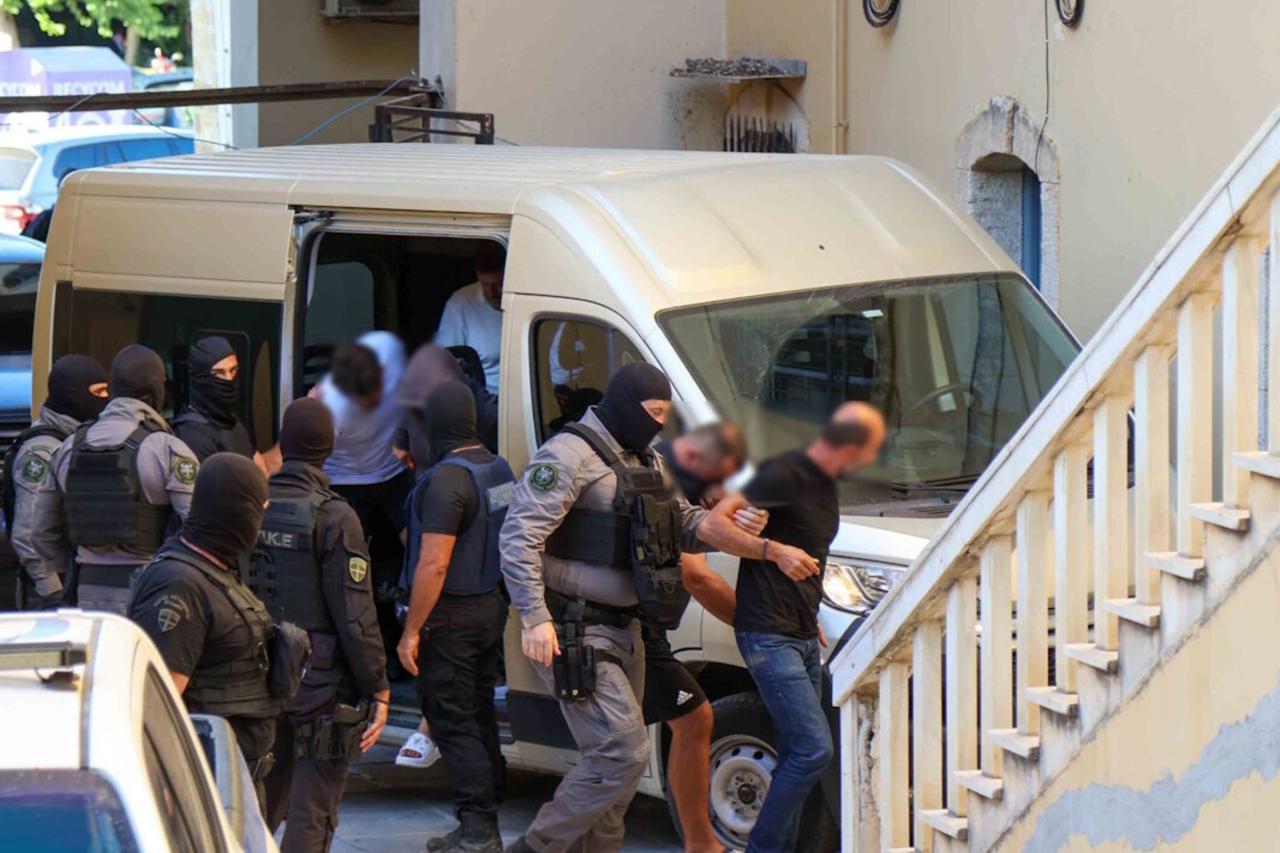Greek police escort suspects after large-scale raids in Crete, where nearly 90 people have been arrested in connection with the Cretan mafia case, Greece, September 4, 2025. (Photo via X / @pelopnews)