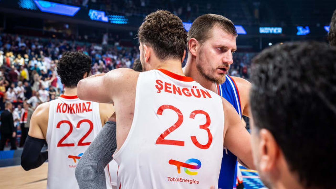 Türkiye's national basketball team faces Serbia in their fifth Group A match at Riga Arena, with Alperen Sengun (23) contesting a play against Serbia's Nikola Jokic (15) In EuroBasket 2025, Riga, Latvia, Sep. 3, 2025. (FIBA Basketball Photo)