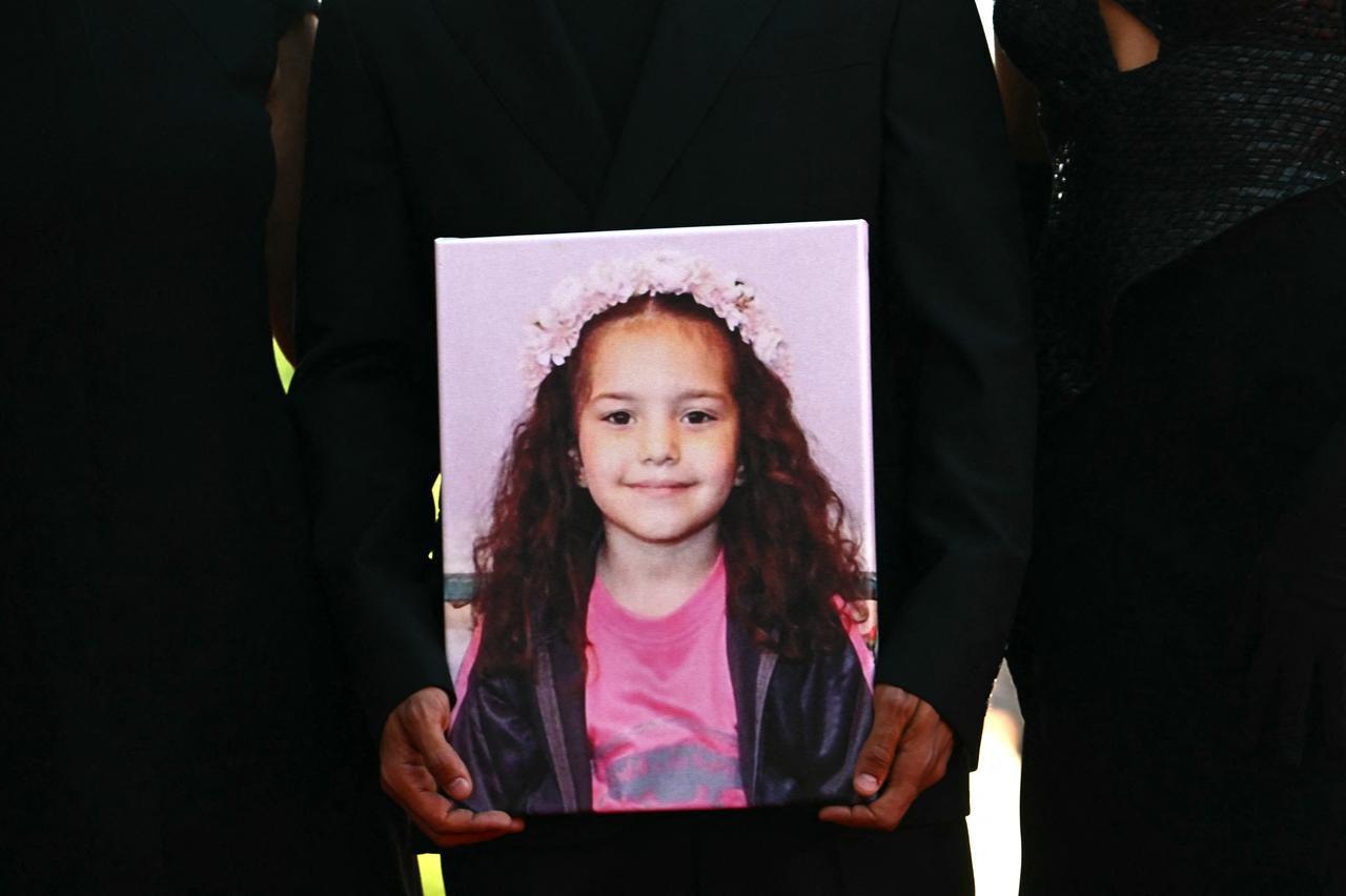 Guests hold a portrait of late Palestinian girl Hind Rajab during the red carpet for the movie "The Voice of Hind Rajab" at Venice Lido on September 3, 2025. (AFP photo)