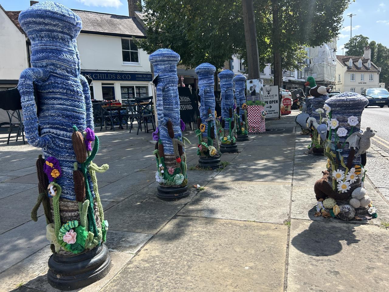 Local mailboxes are adorned with colorful handmade yarn decorations, bringing a whimsical touch to Hertford neighborhoods. Hertford, England, September 4, 2025. (AA Photo)
