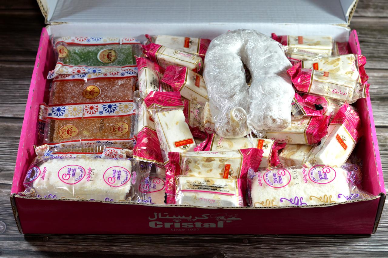 Collection of Eastern candy of creamy taffy, Noga sweets with peanuts, colored taffies with sugar and walnut taffy as a celebration of the prophet Mohamed's birthday, Cairo, Egypt, September 11 2024 (Adobe Stock Photo)