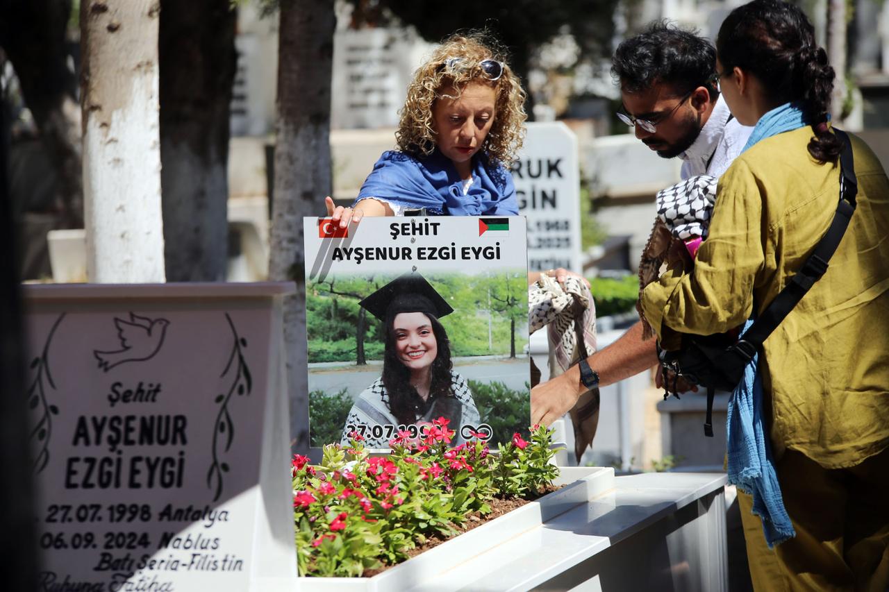 One year after Turkish-American activist Aysenur Ezgi Eygi was killed by Israeli forces during a protest in West Bank, her family and friends visit her grave in Didim district of Aydin, Türkiye on September 05, 2025. (AA Photo)