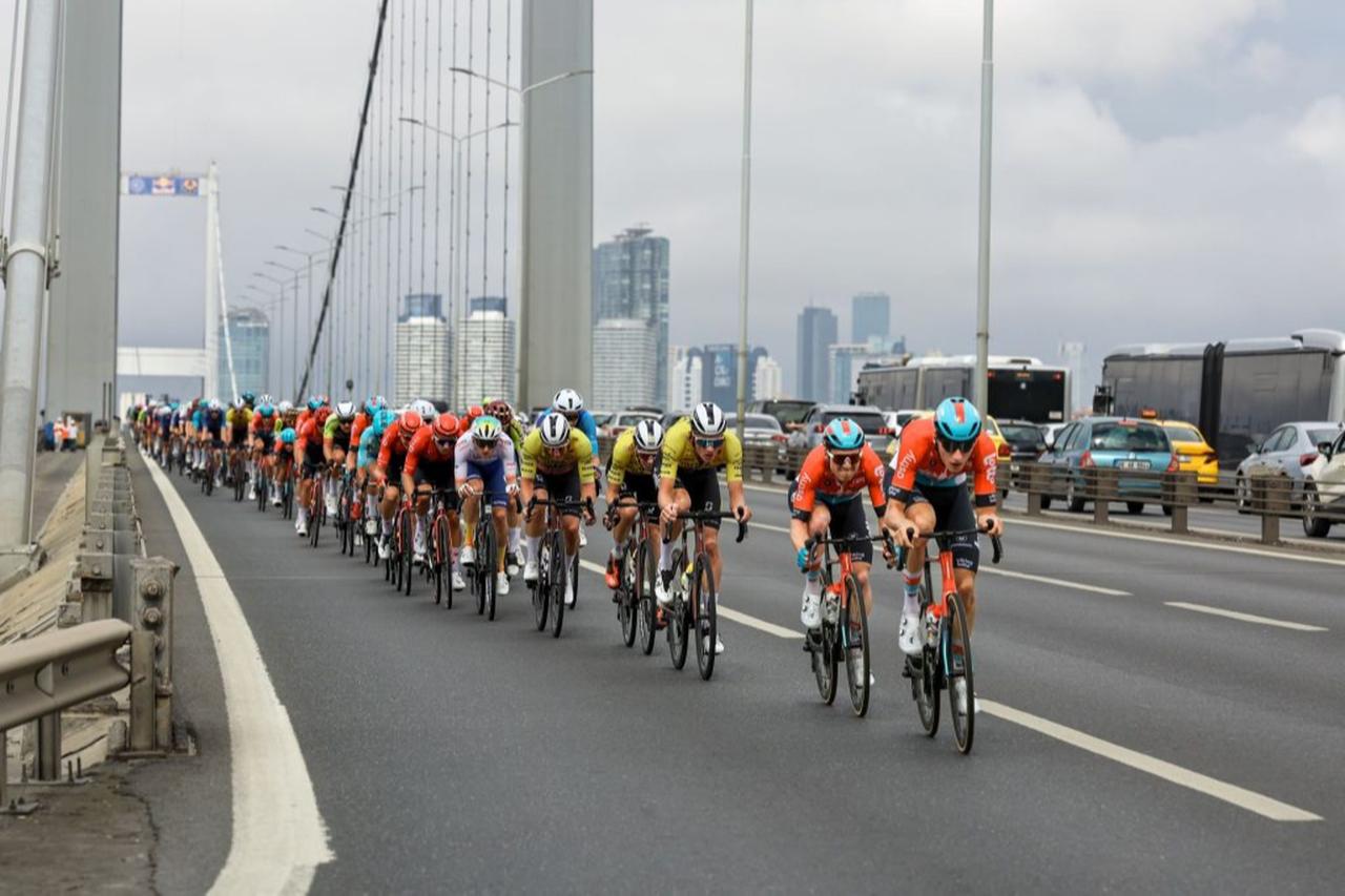 Cyclists compete during the Tour of Istanbul international road race, crossing the Bosphorus Bridge that links Europe and Asia in Istanbul, Türkiye. (Photo via bisiklet.org.tr)