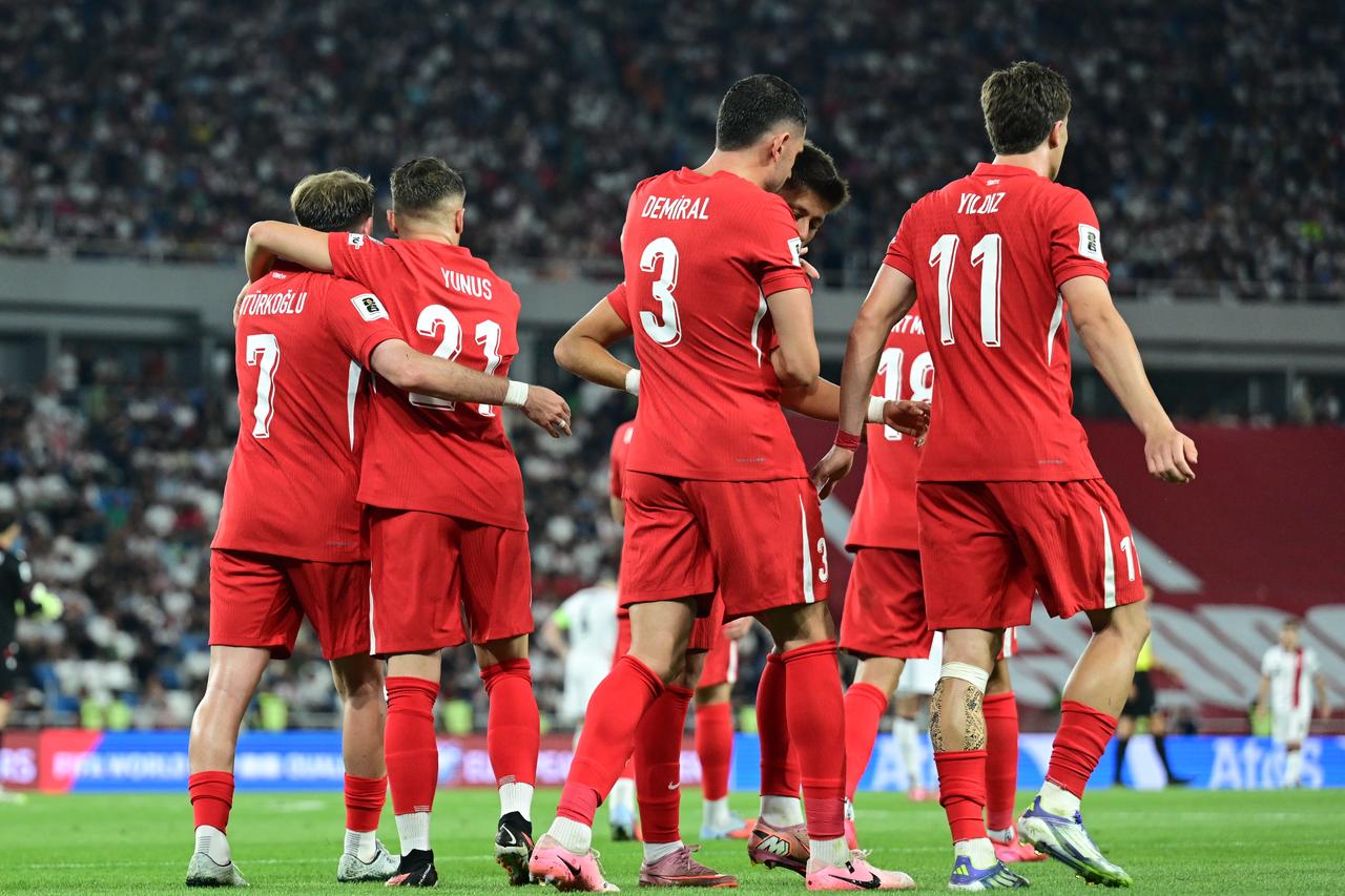 Türkiyes Kerem Akturkoglu (L) celebrates his goal with his teammates at Boris Paichadze National Stadium in Tbilisi, Georgia, September 4, 2025. (AA Photo)