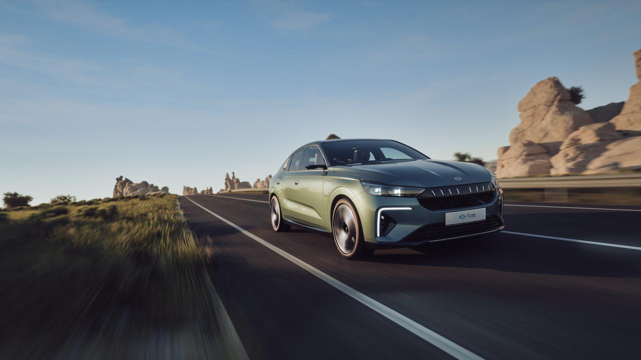 Promotional photo depicts Togg’s newly launched T10F sedan driving on a highway. (IHA Photo)