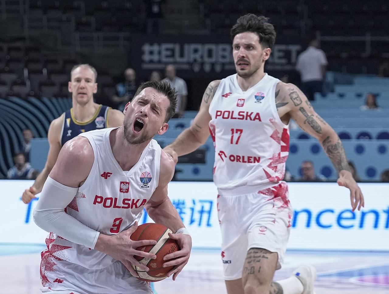 Mateusz Ponitka (9) of Poland in action during FIBA EuroBasket 2025 round of 16 match between Poland and Bosnia and Herzegovina at Riga Arena in Riga, Latvia, September 7, 2025. (AA Photo)