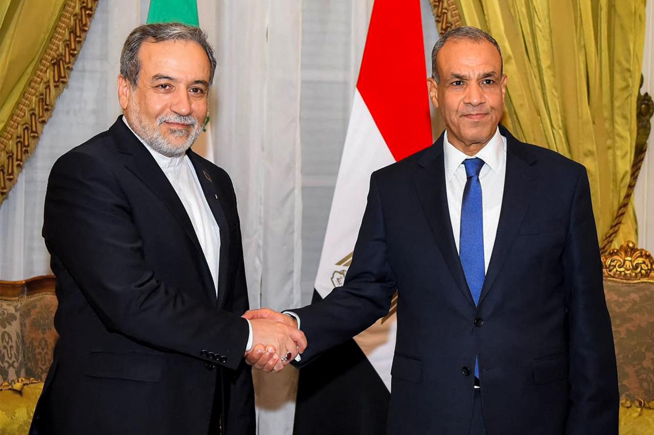 This handout picture provided Irans foreign ministry shows Irans Foreign Minister Abbas Araqchi (L) being received by Egypts Foreign Minister Badr Abdelatty at Tahrir Palace in central Cairo on September 9, 2025. (AFP Photo / HO / Iranian Foreign Ministry)