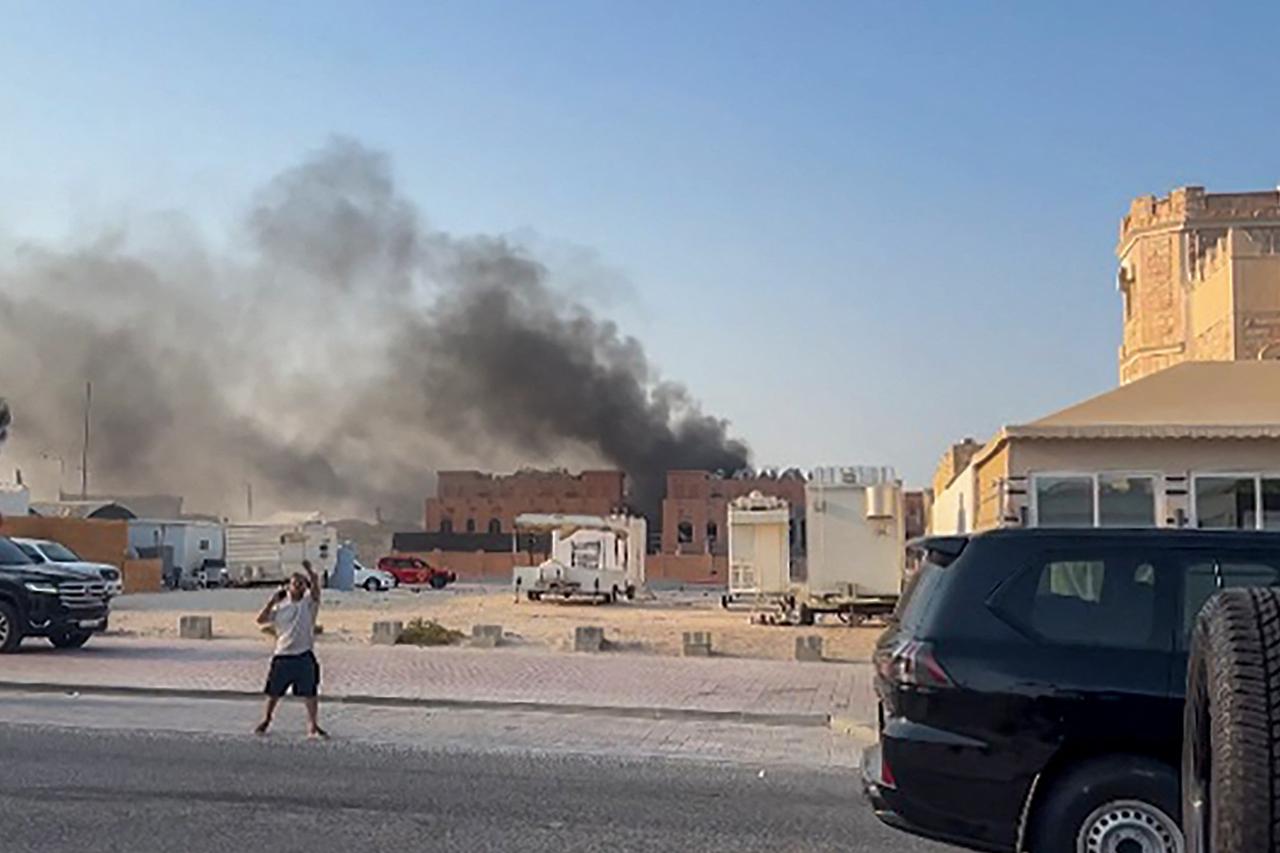This frame grab taken from an AFPTV footage shows smoke billowing after explosions in Dohas capital Qatar on Sep. 9, 2025. (AFP Photo)