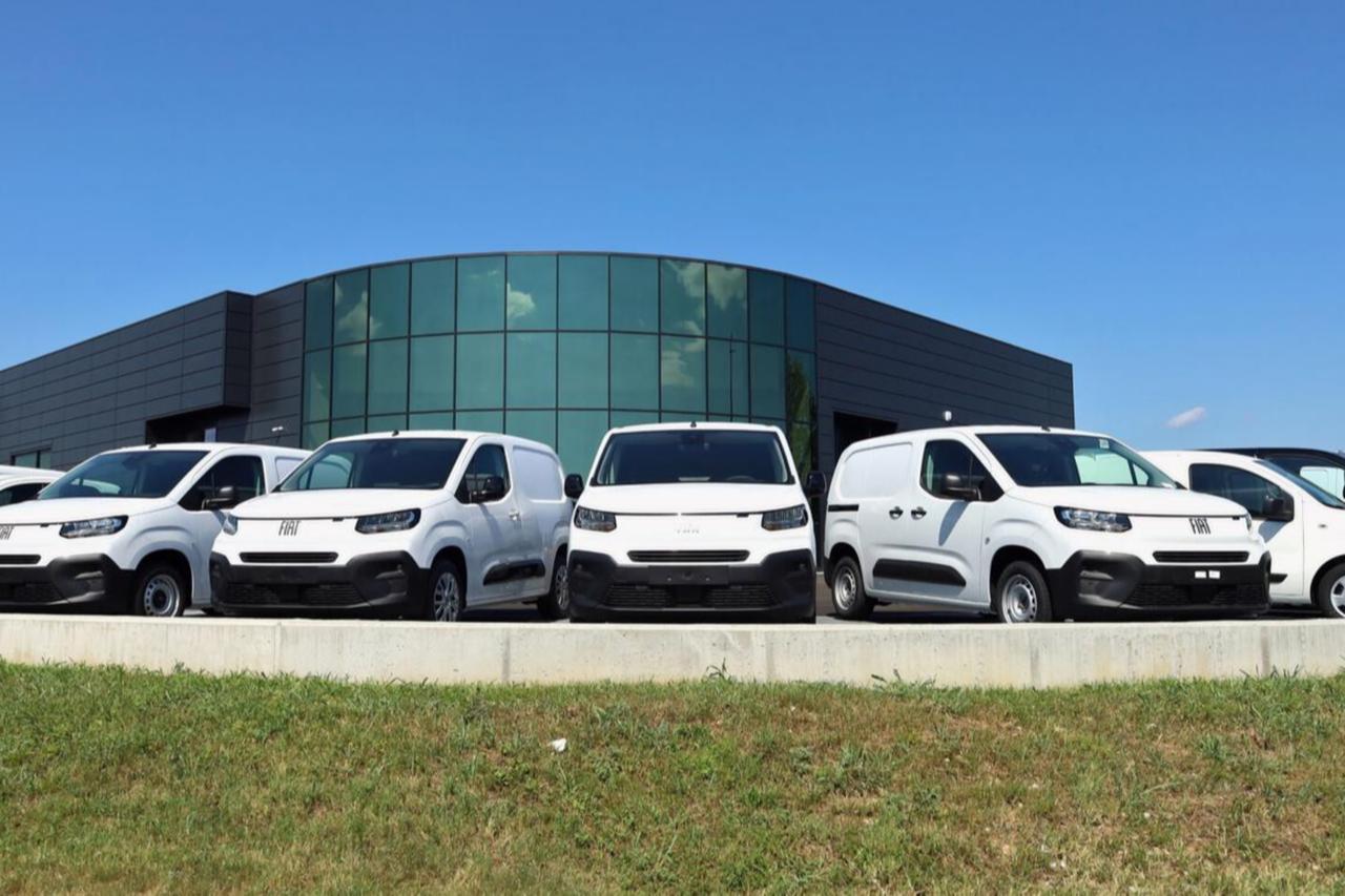 File photo shows newly produced Fiat commercial vehicles lined up at a production facility. (Adobe Stock Photo)
