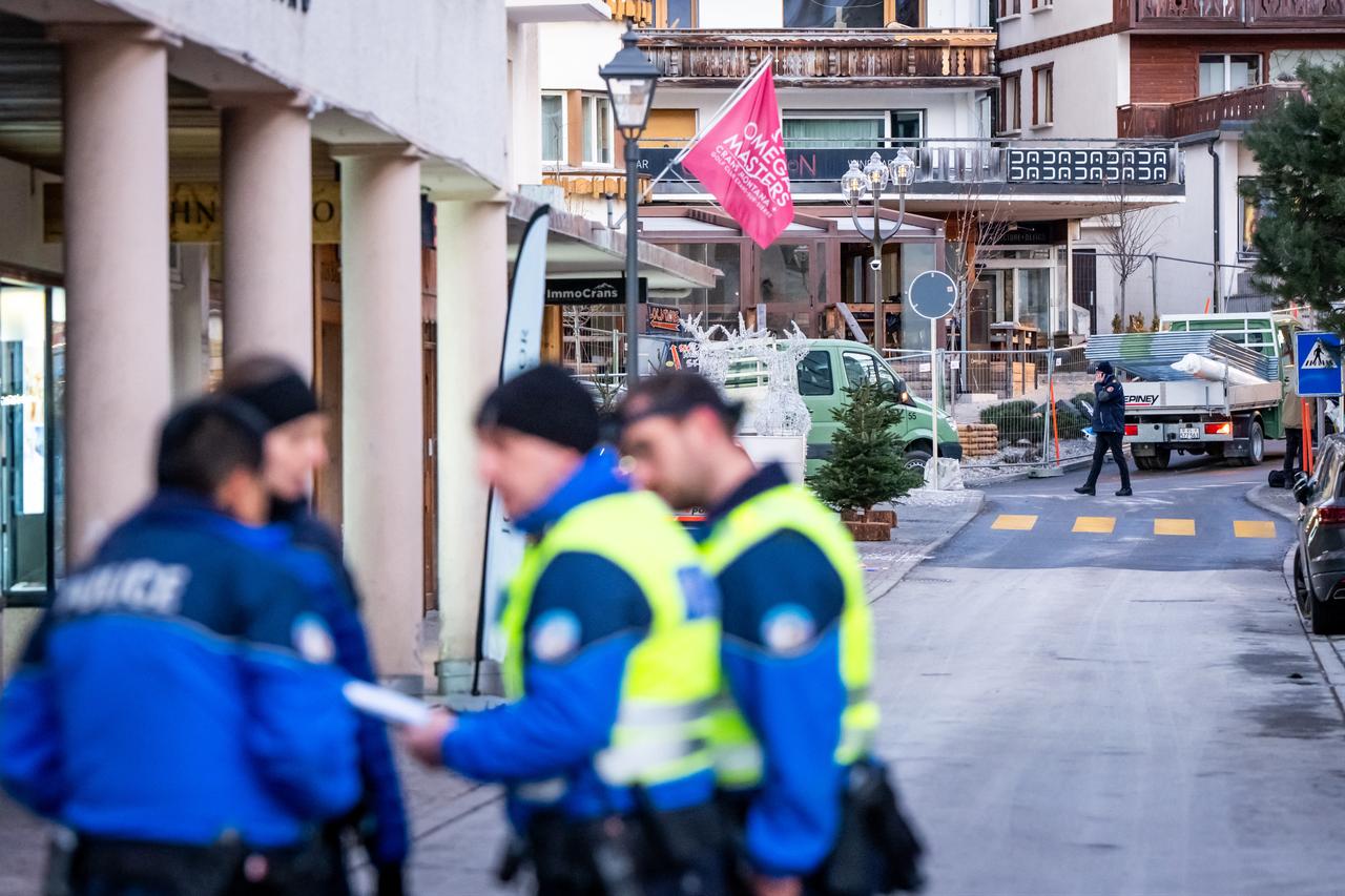 Police officers are seen at the site of an explosion that ripped through a bar in Crans-Montana on January 1, 2026. (AFP Photo)