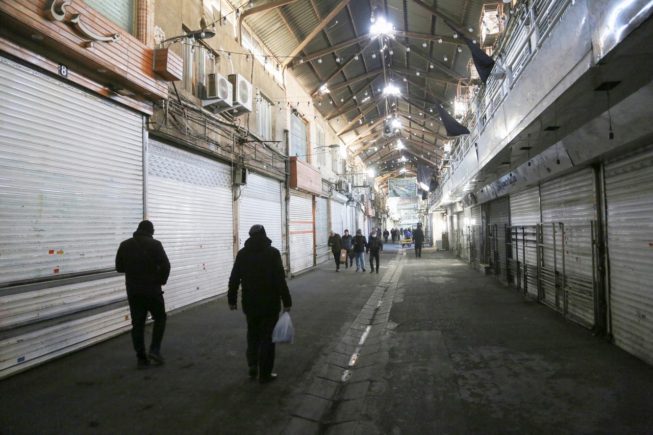 Shopkeepers close their businesses during a protest against rising prices and market instability driven by a rapid increase in foreign exchange rates, in Tehran, Iran, Dec. 31, 2025. (AA Photo)