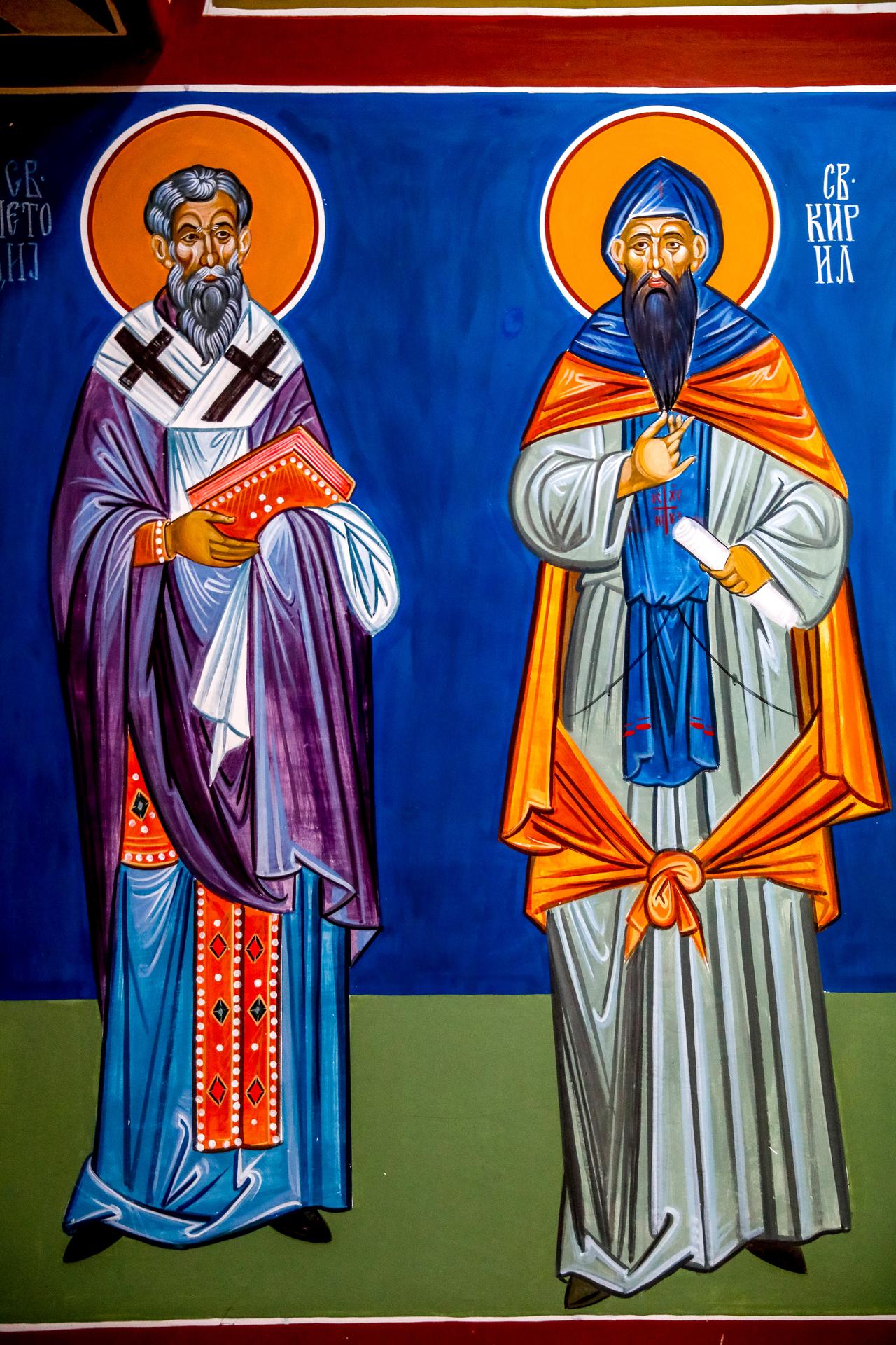 Saints Cyril and Methodius, creators of the Glagolitic alphabet and precursors to Cyrillic, who brought literacy and Slavic written culture to the Balkans in the 9th century. Saint Naum monastery complex, North Macedonia. (Adobe Stock Photo)