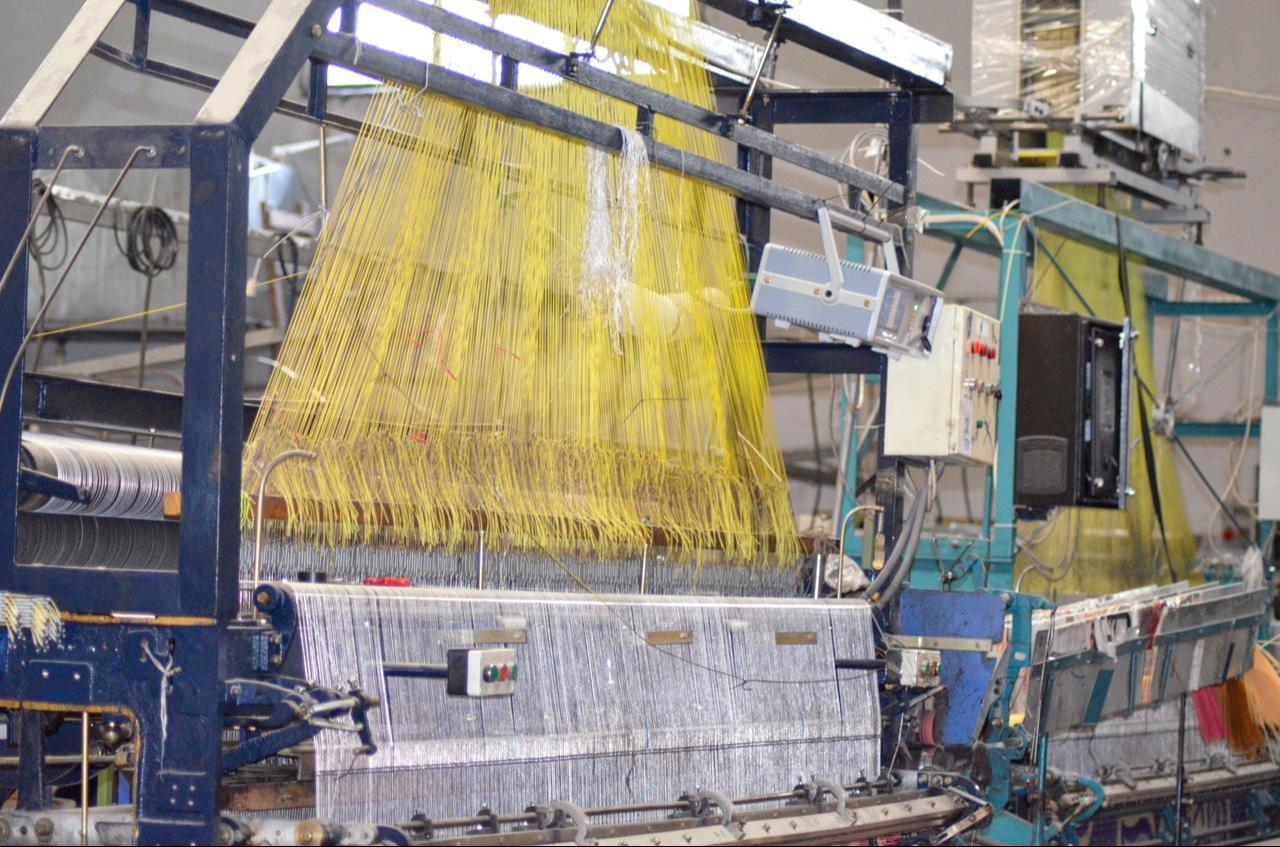 A view inside a carpet manufacturing facility. (Adobe Stock Photo)