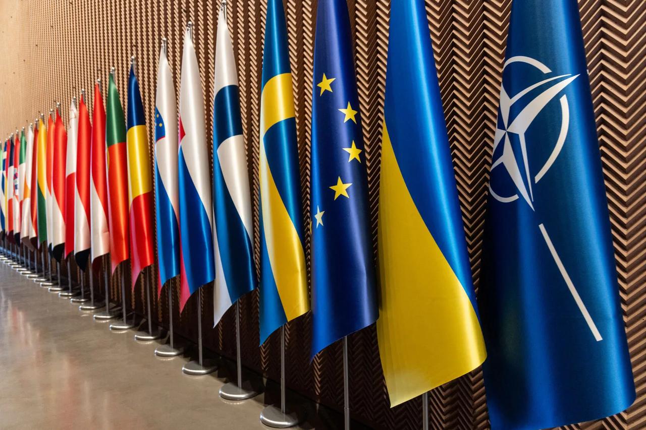 Flags of NATO member states, the European Union, Ukraine, and the NATO alliance stand on display at NATO headquarters in Brussels, Belgium. (AFP Photo)