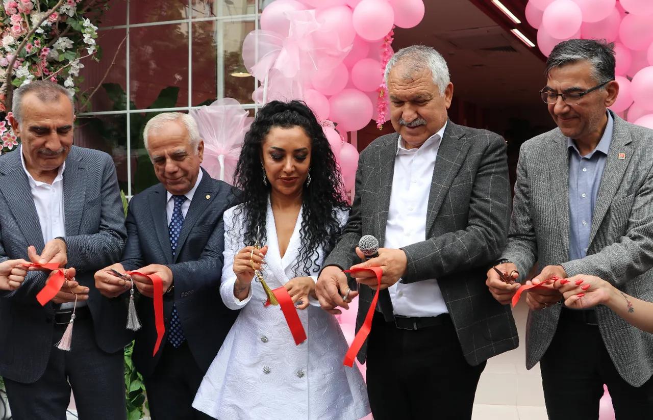 Sinem Cekinmez cuts a red ribbon during the opening of her beauty center called Bellapais, Adana, Türkiye, accessed on January 12, 2025. (Photo via Türkiye Daily)