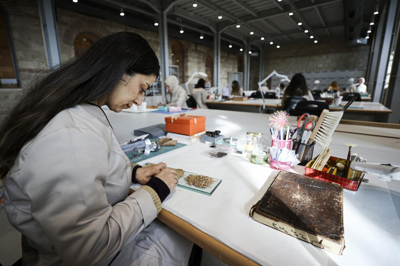 Restorers work on the Book Hospital of Rami Library, Istanbul, Türkiye, Jan. 12, 2023. (AA Photo)