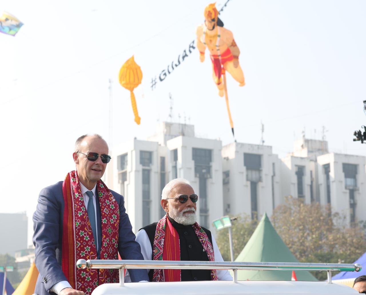 Indian Prime Minister Narendra Modi and German Chancellor Friedrich Merz participate in the International Kite Festival at the Sabarmati Riverfront at Ahmedabad in Gujarat, India, Jan. 12, 2026. (Press Information Bureau (PIB))