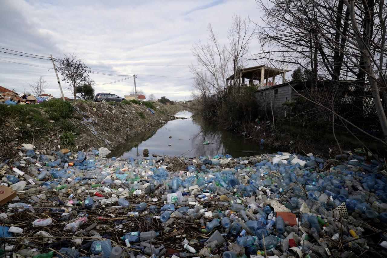 Plastic-choked rivers worsen flooding in Albania as waters recede
