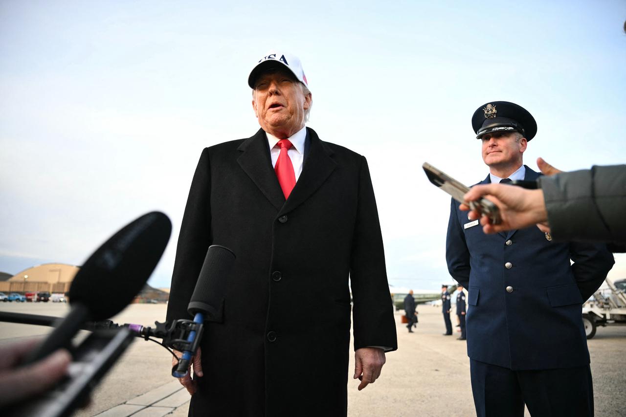 US President Donald Trump speaks to the press upon returning to Joint Base Andrews in Maryland on January 13, 2026. (AFP Photo)