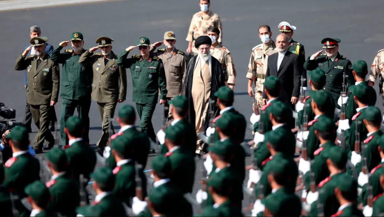 Supreme Leader Ali Khamenei, center, reviews a group of armed forces cadets during their graduation ceremony accompanied by commanders of the armed forces, at the police academy in Tehran, Iran, Monday, Oct. 3, 2022. (Photo via Office of the Iranian Supreme Leader)