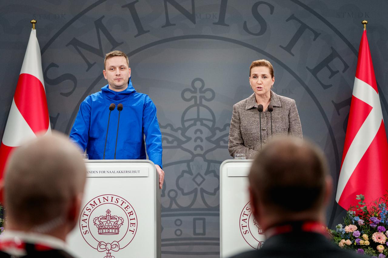 Greenland's Head of Government (Naalakkersuisut) Jens-Frederik Nielsen (L) and Denmark's Prime Minister Mette Frederiksen give a statement in the Mirror Hall at the Prime Minister's Office in Copenhagen, on Jan. 13, 2026. (AFP Photo)