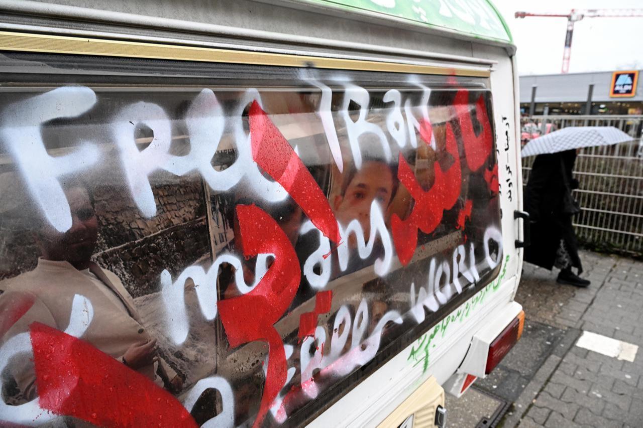 A motorhome painted in support of the Iranian protesters is pictured in front of the closed Consulate General of Iran in Frankfurt am Main, western Germany, on January 14, 2026. (AFP Photo)