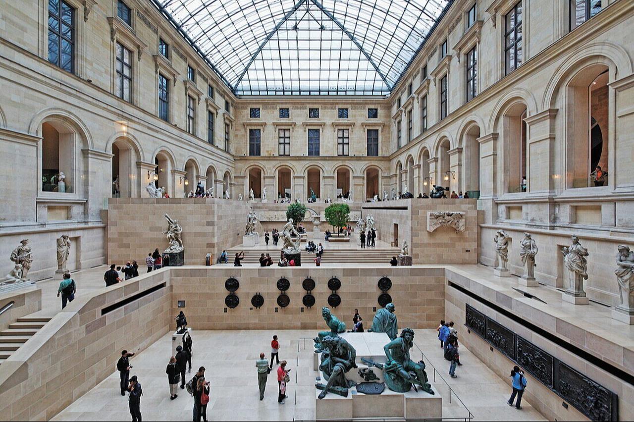 People inside of the Louvre, Paris, France, Aug. 15, 2010. (Photo by Franz Marc Frei)