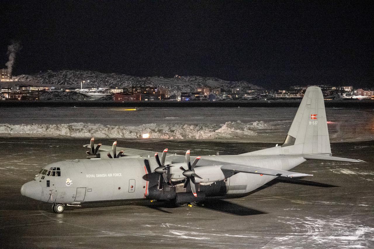A Royal Danish Air Force (RDAF) Lockheed C-130J Super Hercules is parked on the tarmak at Nuuk international airport on January 15, 2026 in Nuuk, Greenland, the day after it arrived transporting Danish military personnel. (AFP Photo)
