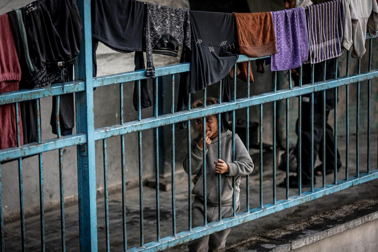 Palestinian families, living around the courtyard of a school, struggle to continue their daily lives under harsh conditions at Tel al-Hawa neighborhood in Gaza city, Gaza on Jan. 15, 2026. (AA Photo)