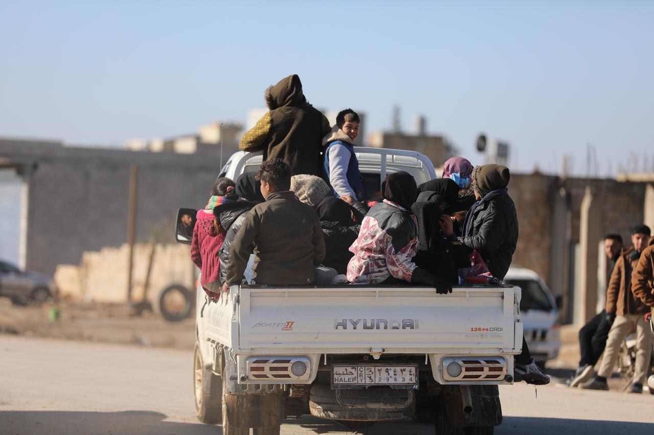 Evacuation of civilians continues under difficult conditions due to obstruction by the YPG, operating under the name SDF, after a humanitarian corridor was opened this morning by the Syrian army for the temporary evacuation of civilians living west of the Euphrates River in areas previously declared military zones, in Aleppo, Syria on Jan. 15, 2026. (AA Photo)