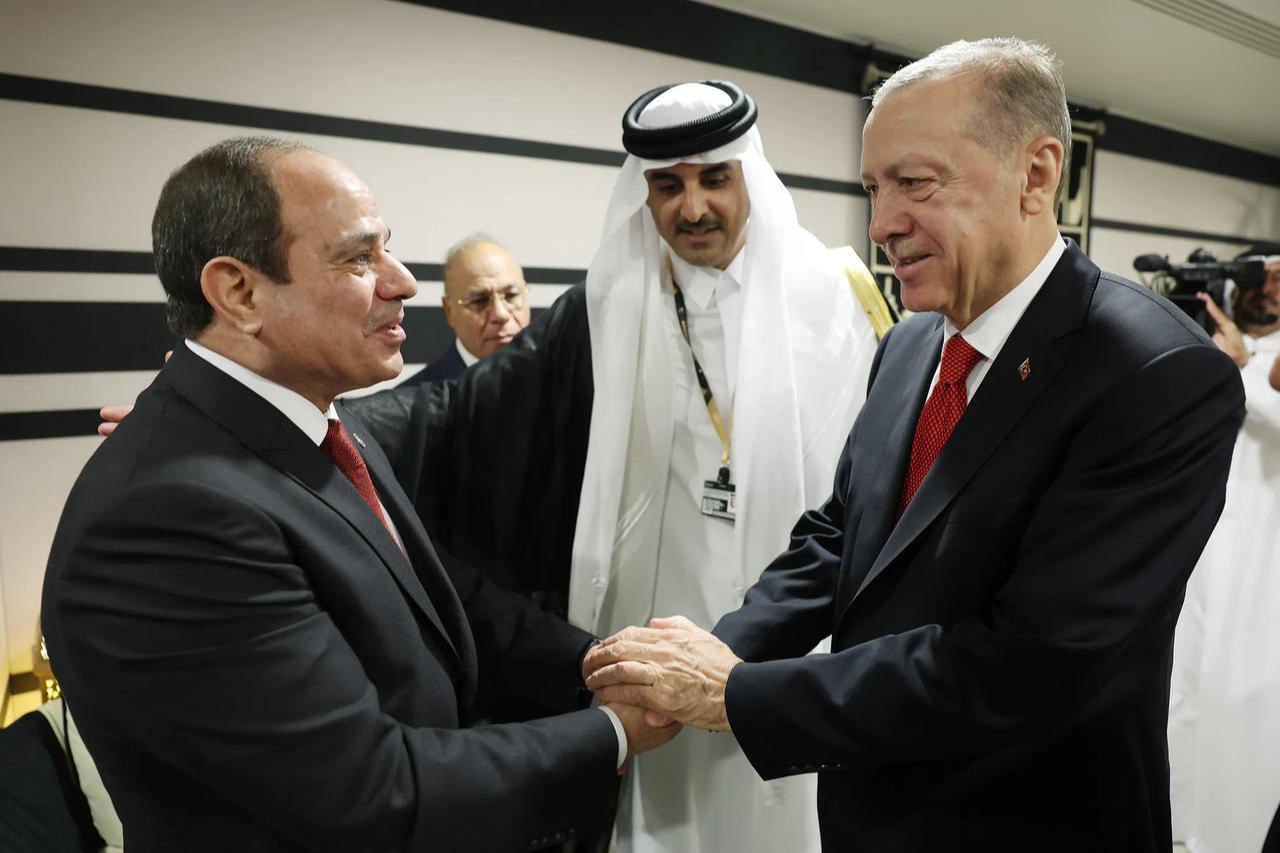 Recep Tayyip Erdogan, right, greets Abdel Fattah el-Sisi as they attend a reception at the opening ceremony of the 2022 FIFA World Cup in Qatar on Nov. 20. (AA Photo)
