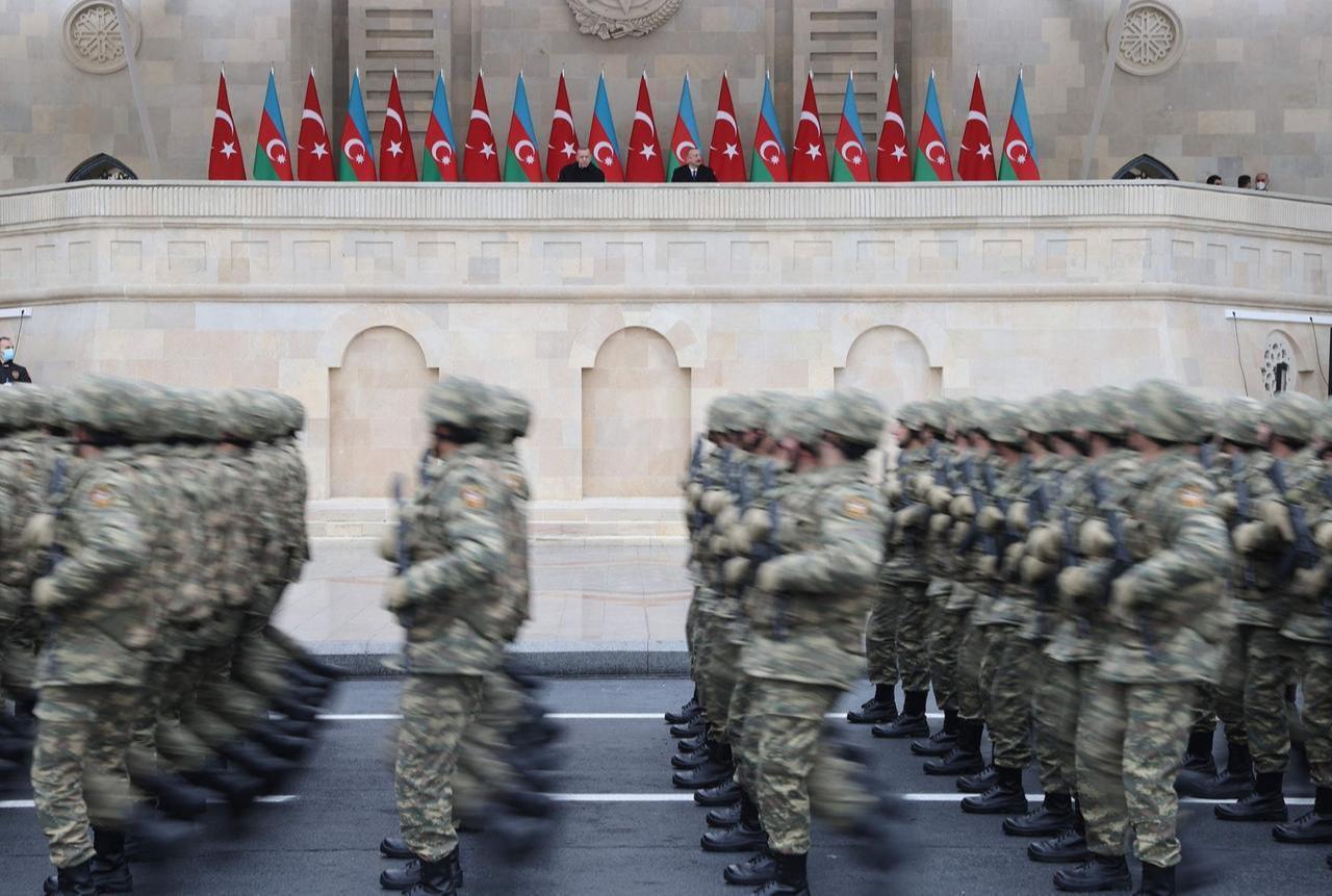 President Recep Tayyip Erdoğan (L) and Azerbaijani President Ilham Aliyev attend a parade in Baku, Azerbaijan, Dec. 10, 2020. (AFP Photo)