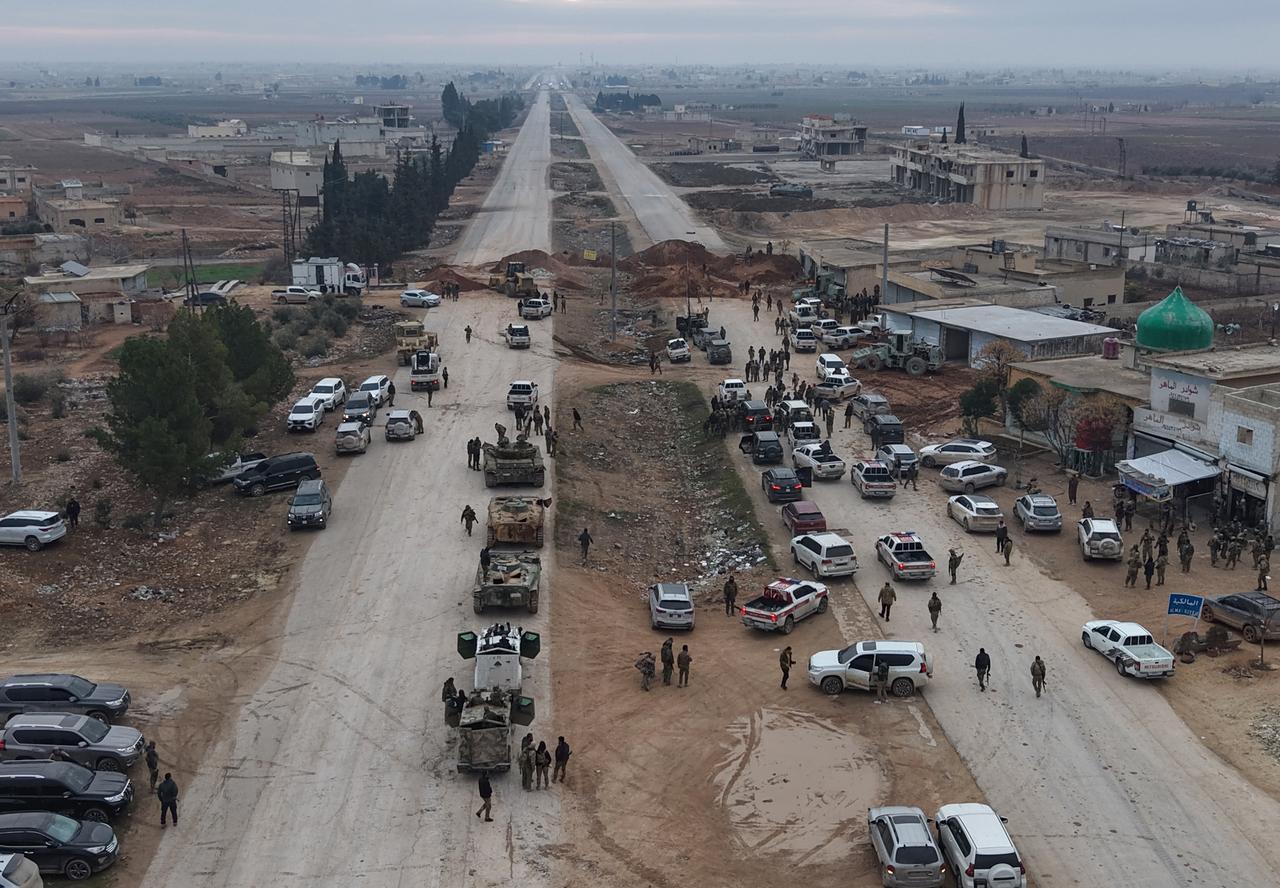 Syrian army units seen entering Deir Hafir, west of the Euphrates, after the withdrawal of the terrorist organization YPG/SDG in Syria, Jan. 17, 2026. (AA Photo)
